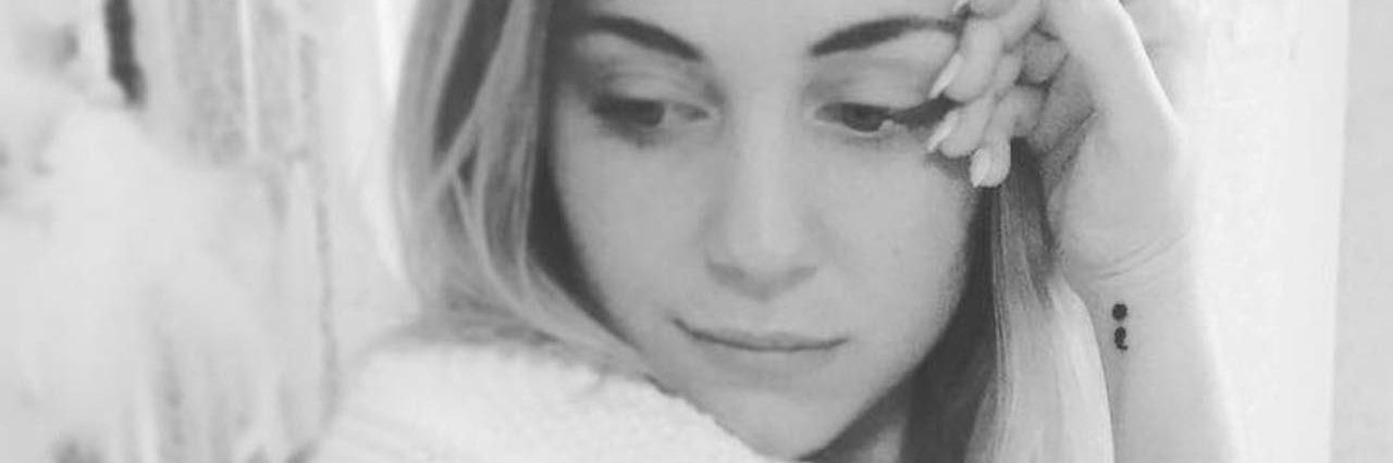 Positives of Anxiety: It Makes You Be Your Own Hero A closeup of a blond haired girl looking down