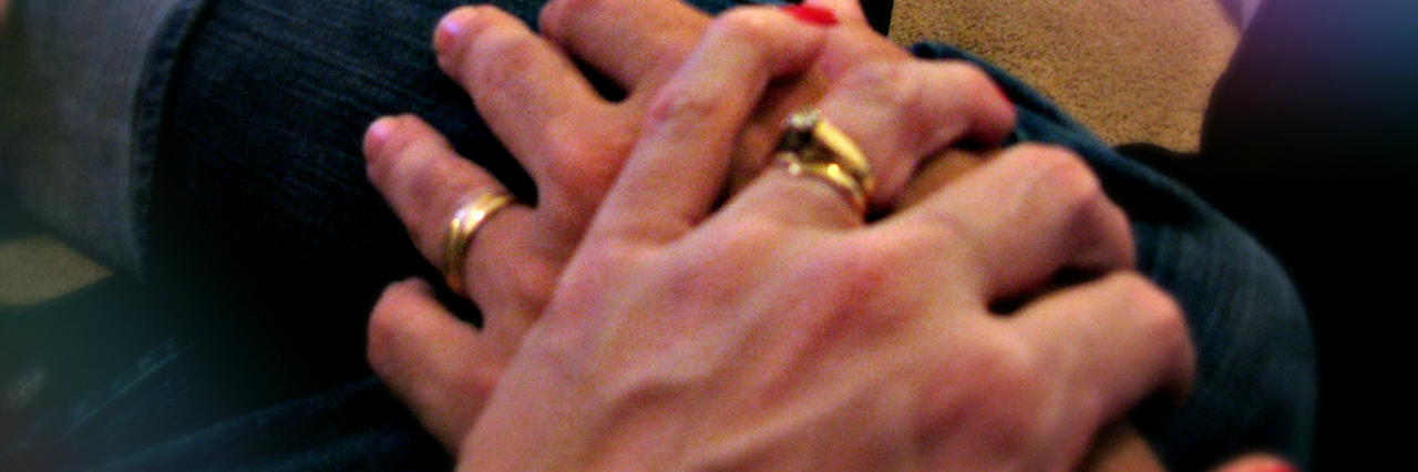 How Grieving Can Make You Understand Depression A couple clasping hands