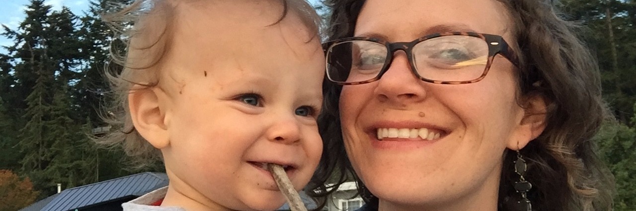 Lessons Losing My Temper Because of Chronic Illness Will Teach My Kids woman at park holding toddler son