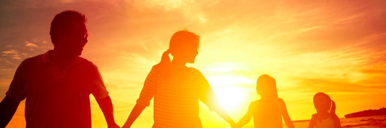 Celebrating Small Moments After My Daughter’s Autism Diagnosis family walking on the beach