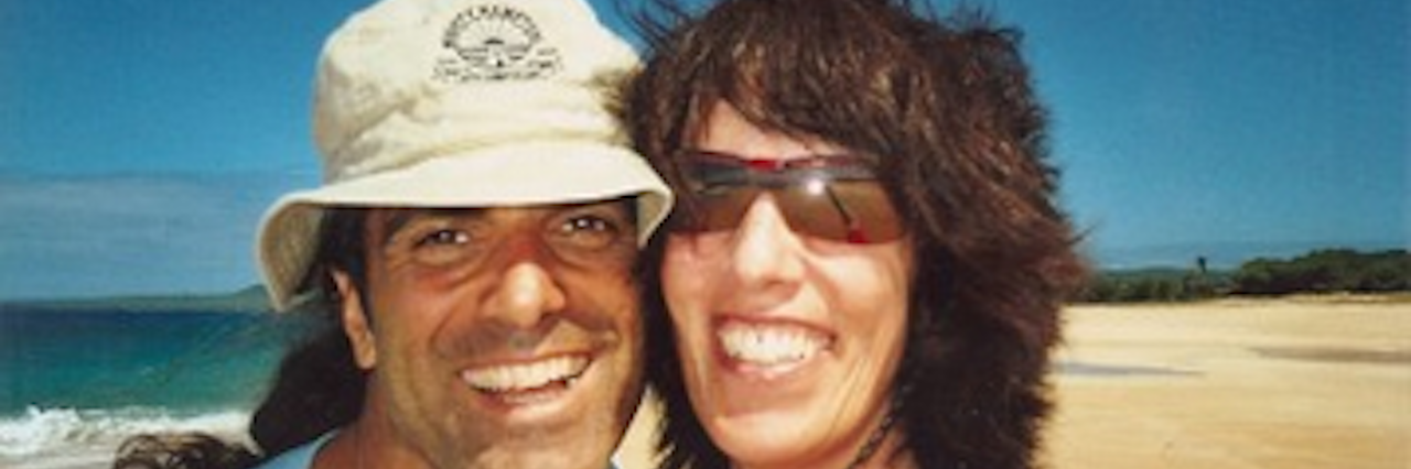 Lessons Learned After Losing Someone to Suicide couple smiling on beach