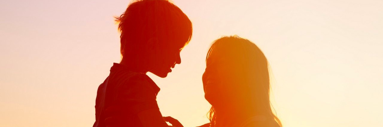 Mother Asks You to Not Make Assumptions About Her Autistic Son mother and son during sunset
