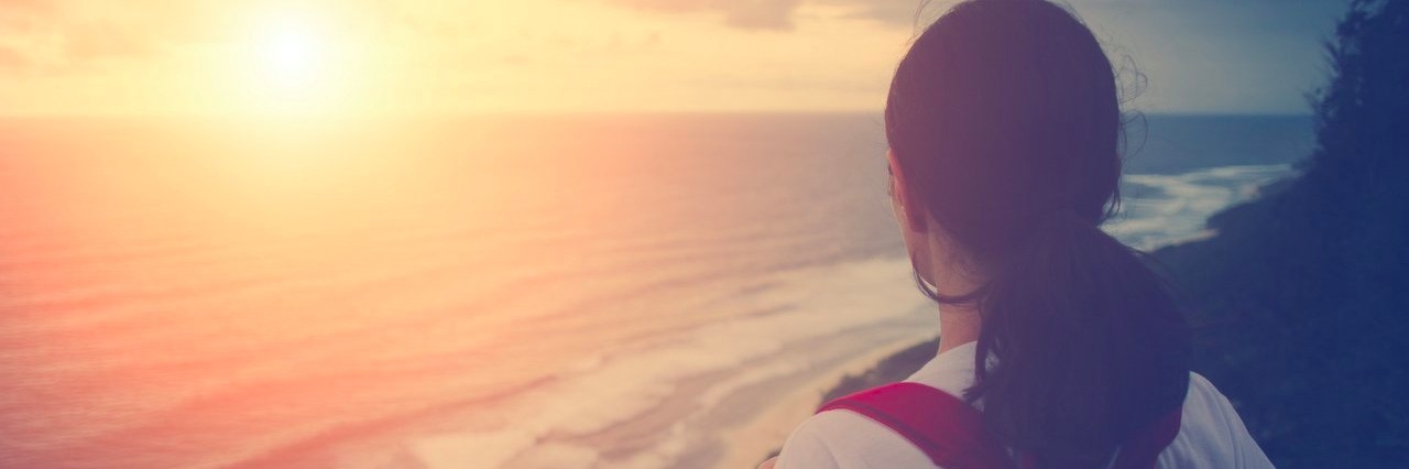 I’m Grateful for My Autism Diagnosis woman watching sunset