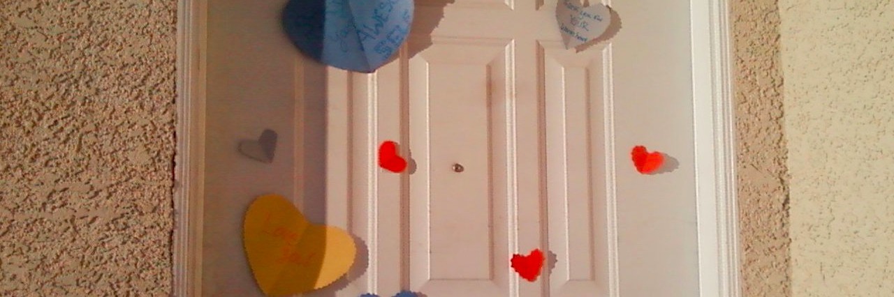 Chronic Illnesses: My Body Is Telling Me It’s OK to Slow Down door covered with paper hearts
