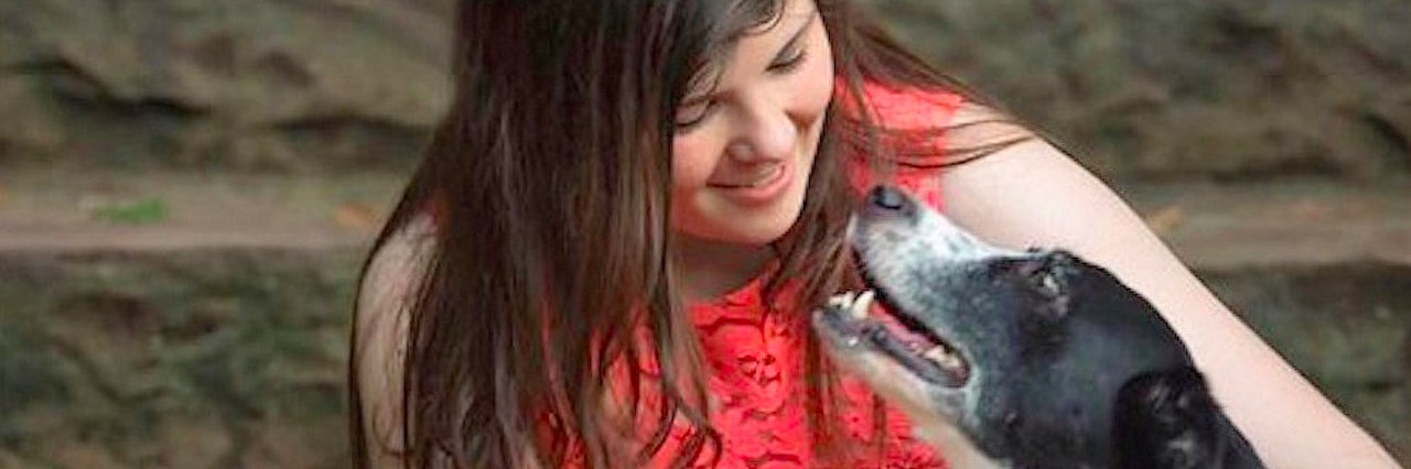 young woman with therapy pet