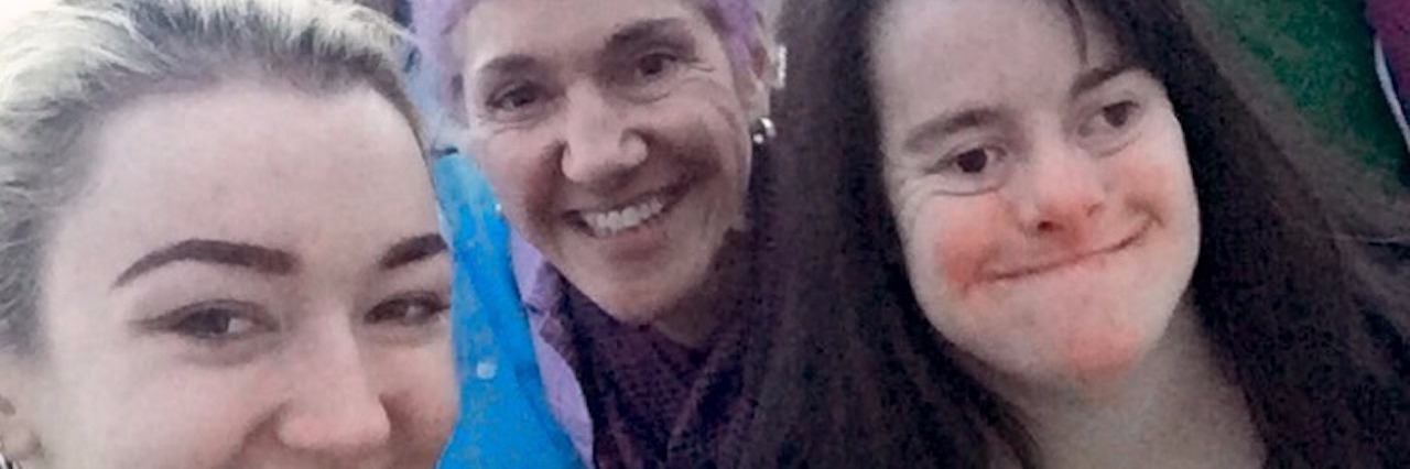 We May Never Be Empty-Nesters: Having a Child With Down Syndrome family selfie in paris