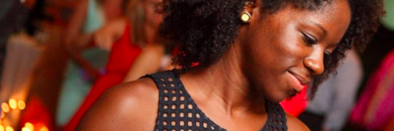 Surviving Depression and Getting Breast Cancer woman smiling at a wedding