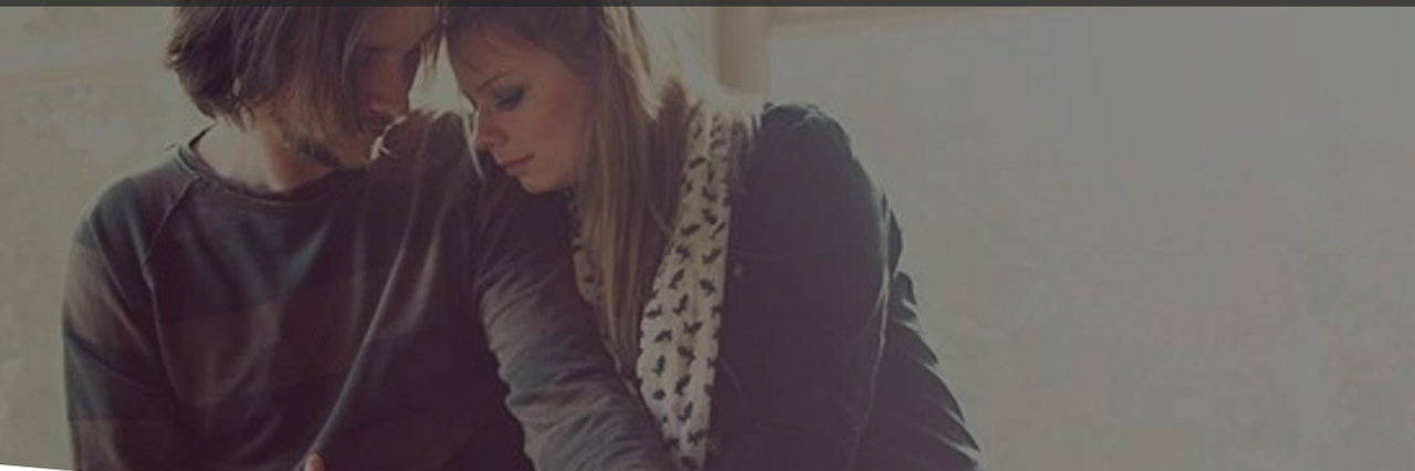 How My Husband Loves Through My Thoughts of Suicide A boyfriend and girlfriend leaning on each other