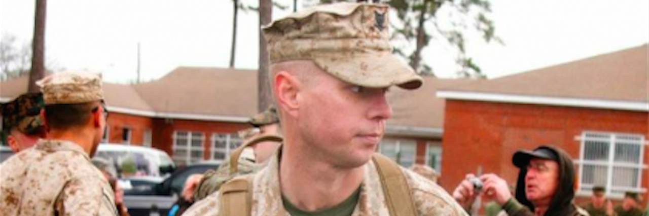 man in the army wearing his uniform