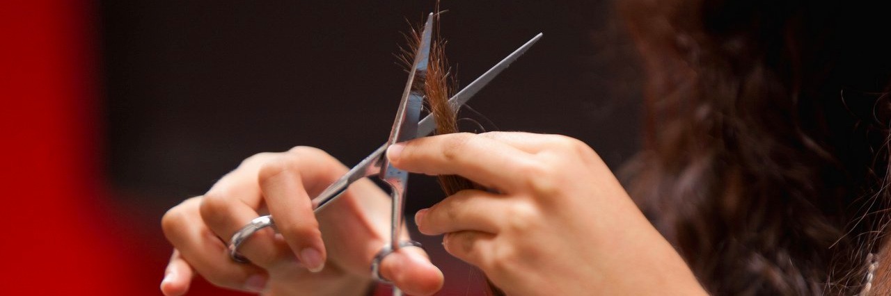 Leukemia: Losing My Hair for a Cause woman getting a haircut