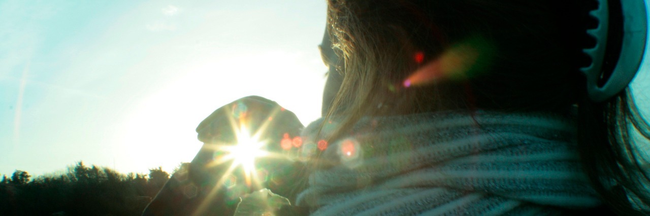 40 Quotes That Help Me With My Anxiety and Depression woman looking at a sunset