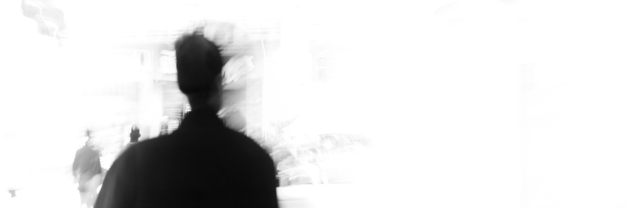 Struggling With Perfection and Obsessive-Compulsive Disorder (OCD) city business people urban scene abstract background, blur motion