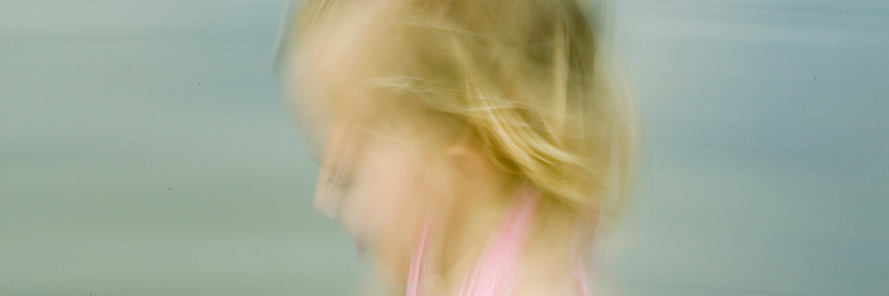 Accepting My Life With Anxiety Girl running outdoors.