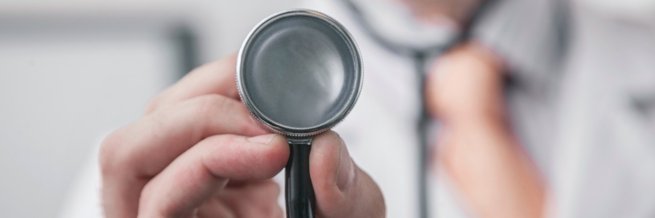 Doctor Was Too Uncomfortable to Talk About My Depression male holding a stethascope