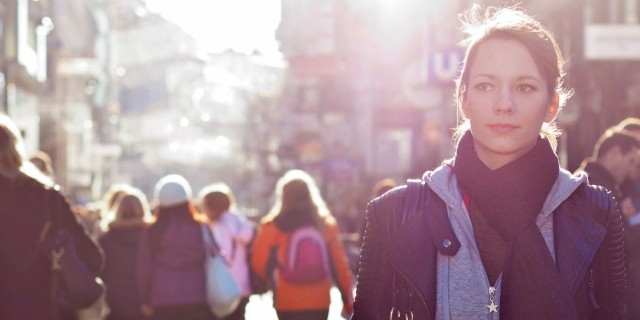 The Good and Bad of Involuntary Psychiatric Treatment, From an Involuntary Patient urban girl standing out from the crowd at a city street