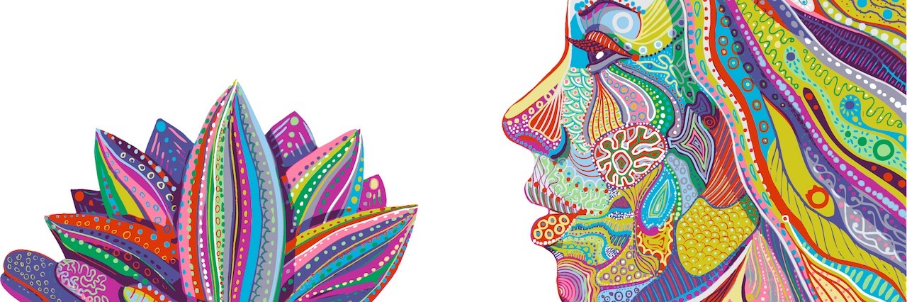 Describing Depression to People Who Don't Understand woman holding a lotus flower