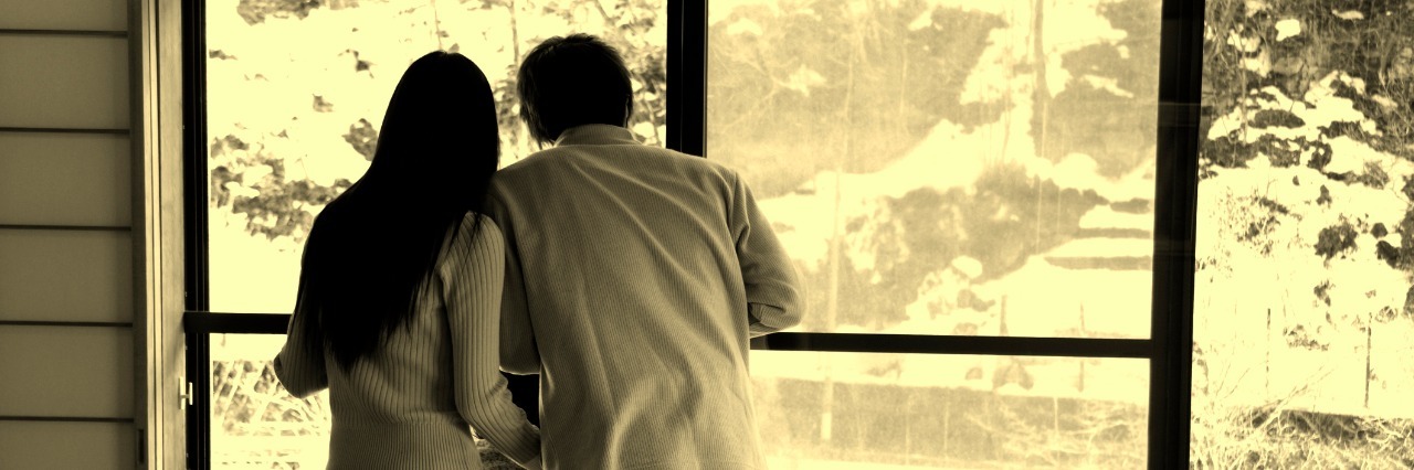 Managing Sorrow and Losing Support When Parenting a Child With Illness Family looking out window