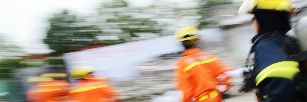 How to Be Prepared for a Terrorist Attack If You Have a Disability Emergency workers running.