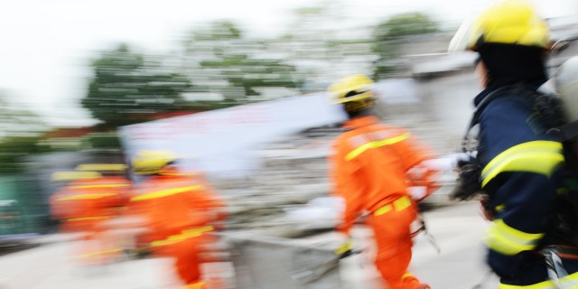 Emergency workers running.