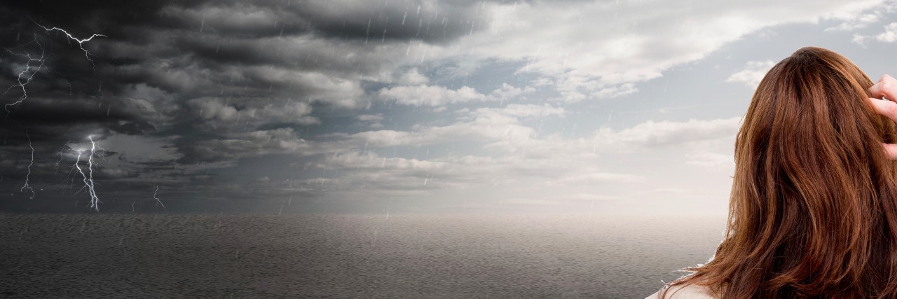 Suicidal Ideation: When Suicide Is No Longer an Option woman looking out at stormy skies