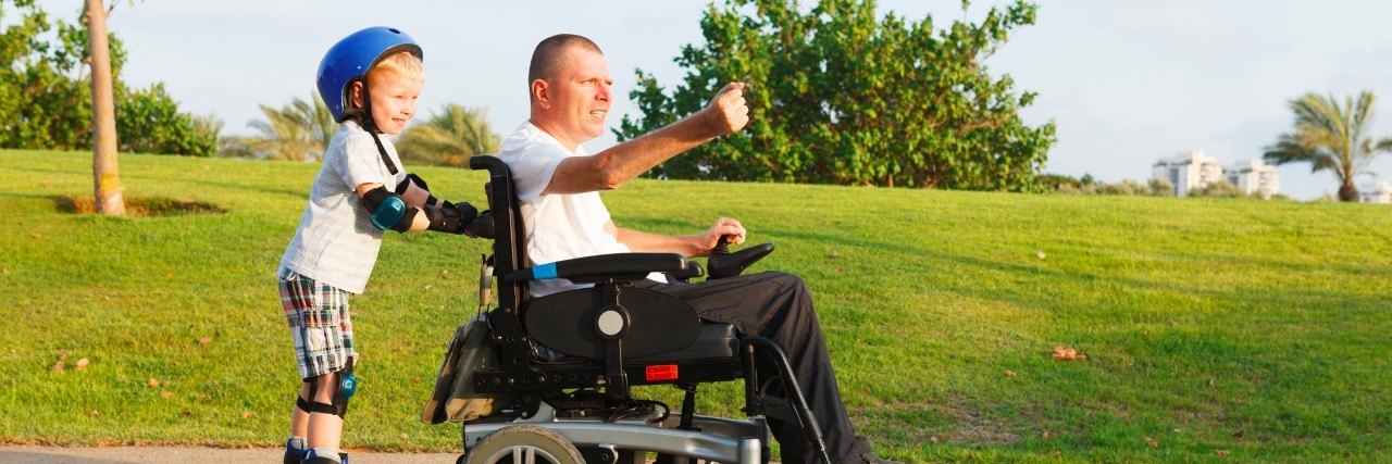 People With Disabilities Don't Need to Be 'Fixed' or 'Cured' Disabled father rollerblading with son
