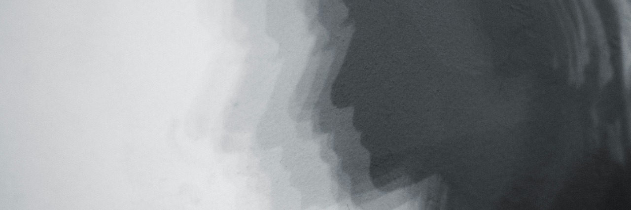 What Depression Makes You Believe shadow of woman's face on a wall