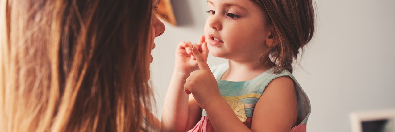 What It's Like Being a Single Mom With Anxiety A mom holding her small child