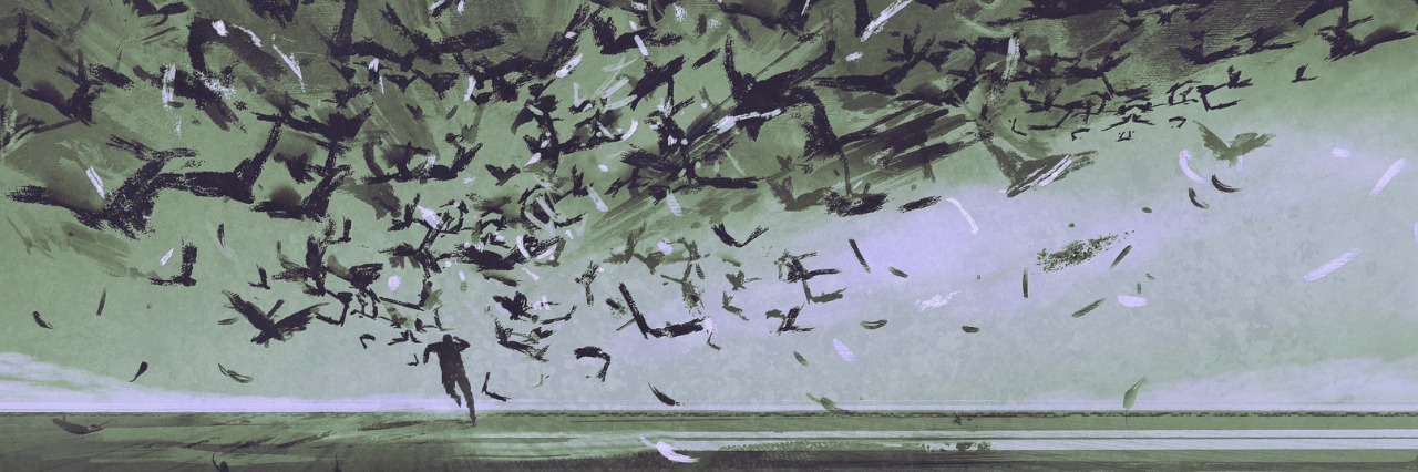 What It Feels Like When Anxiety Makes You Afraid a man surrounded by dark birds in a field