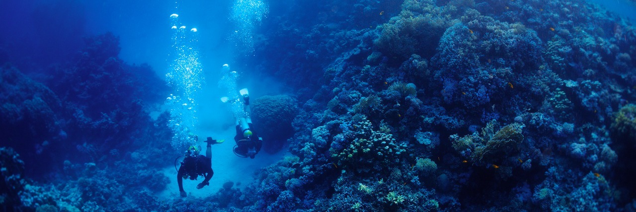 Constant Depression Comes in Waves Instead of 'Episodes' diver deep in the ocean