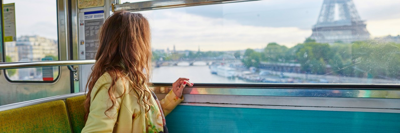 Explaining My Chronic Illness to a Stranger on the Train Woman on a train.