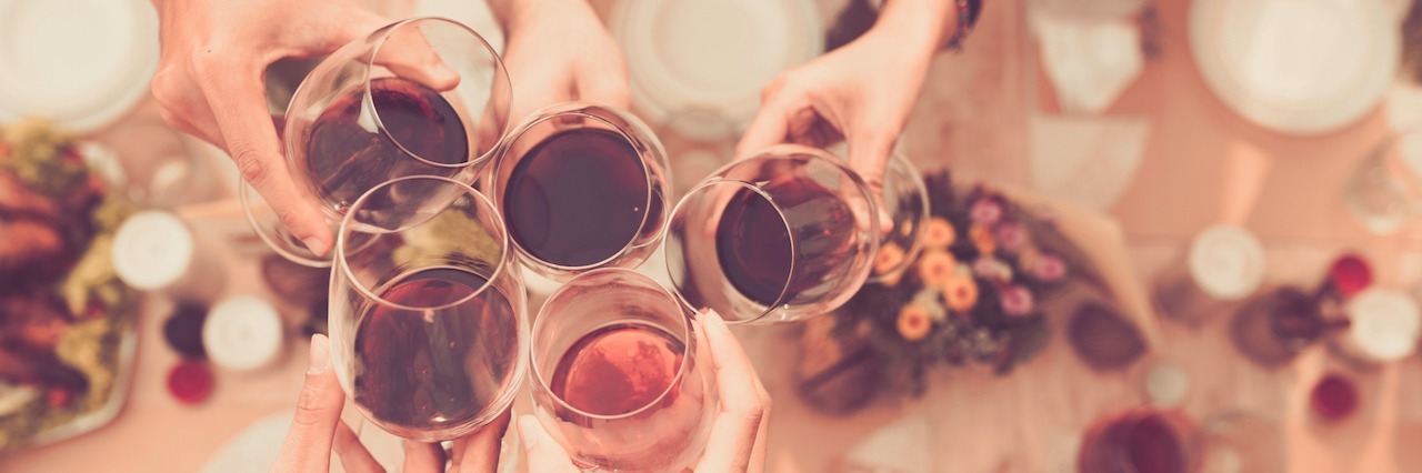 When You Are Trying to Find Yourself After Addiction friends toasting glasses of wine