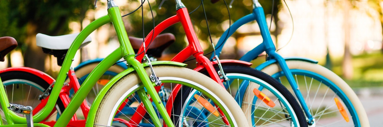 To the Future Wife of a Man With Chronic Conditions three colorful bikes lined up outside
