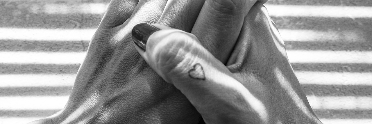 Letter to Person Contemplating Suicide, From Someone Who Understands woman with her hands clasped