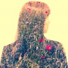 Double exposure a business woman with meadow inside.