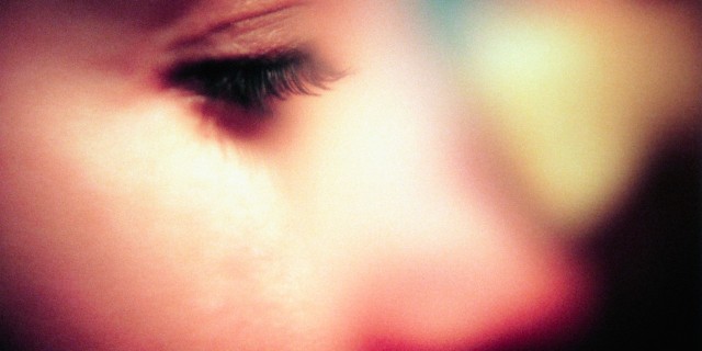 When I Realized These Physical Sensations Were My Version of Panic Attacks Close-up photo of profile of a woman