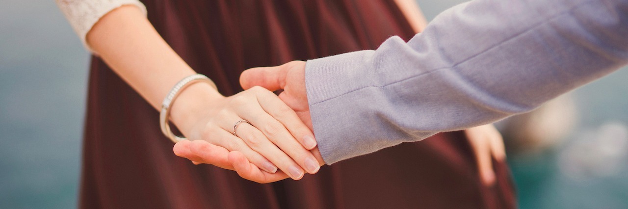 What a Person With Anxiety Needs Friends and Family to Know couple holding hands