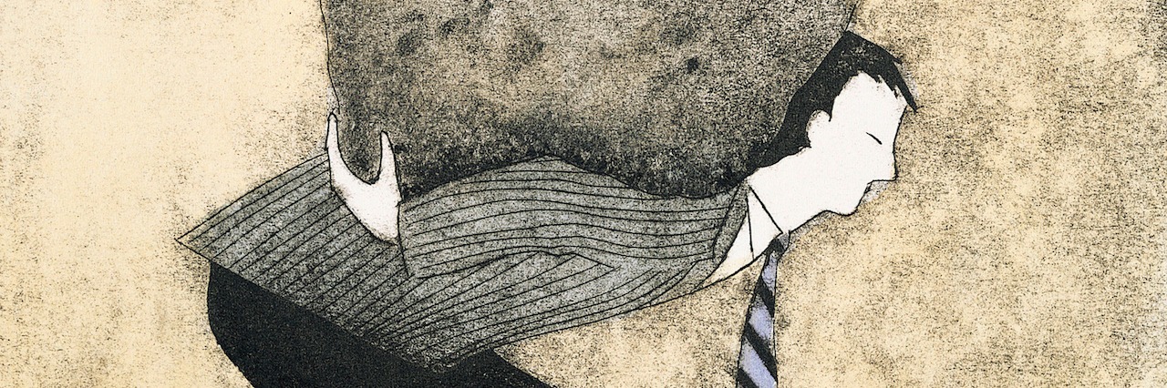 The Challenges of Maintaining Sobriety After Rehab man holding a rock on his back