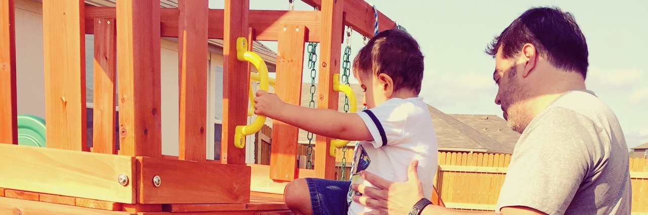 Thank You to My Child's Occupational, Speech and Physical Therapists physical therapist helping boy up slide