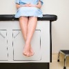 Patient sitting on exam table