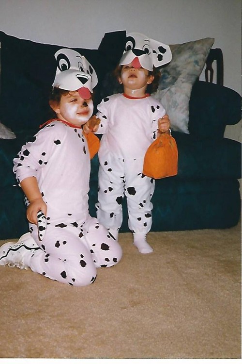 two girls wearing dalmatian costumes for halloween