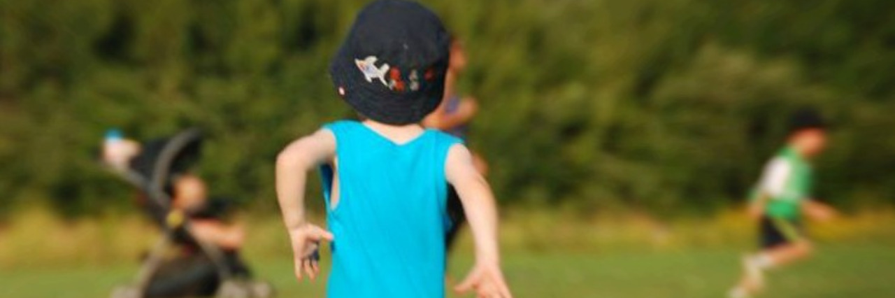 Why Paralympic Athlete Shayne Dobson Is a Role Model for My Son Little boy running.