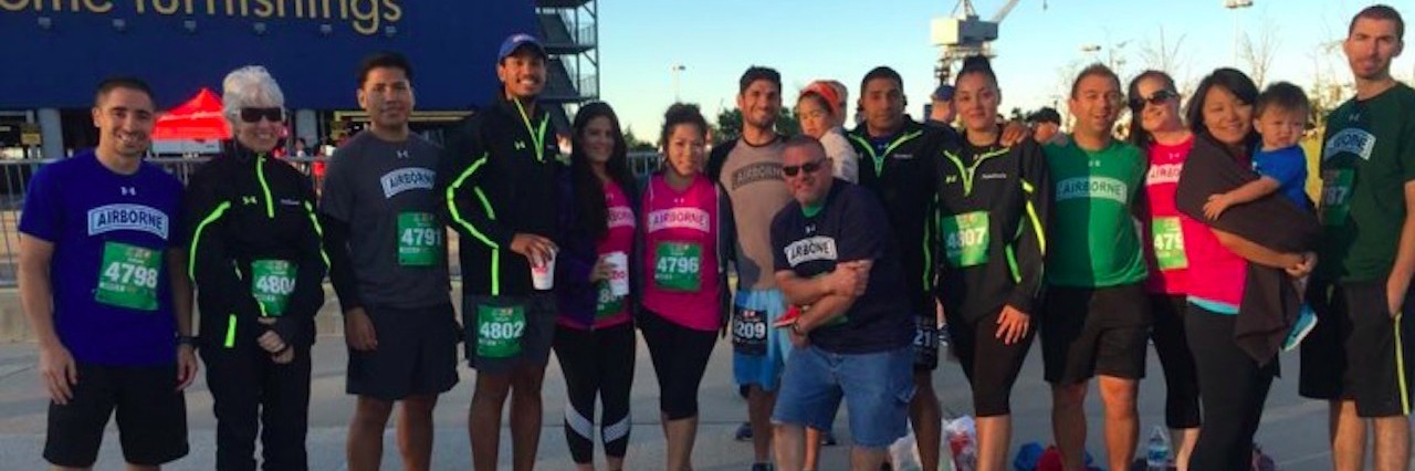 When Others Avoid Talking About My Partner After His Suicide group of 5k runners in front of ikea store