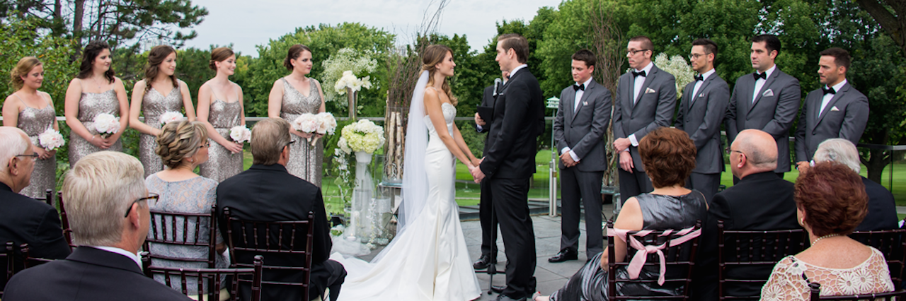 Dating and Getting Married With an Ostomy bride and groom at wedding ceremony