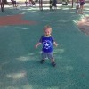 little boy with down syndrome at the park
