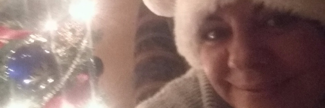 Happy Chrisoween! Our Holiday for Mental Illness Management woman in santa hat