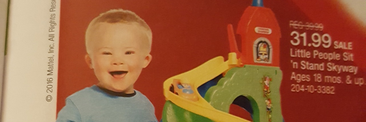 Mom Thanks Target for Featuring Son With Down Syndrome in Toy Book little boy with down syndrome in target's toy book
