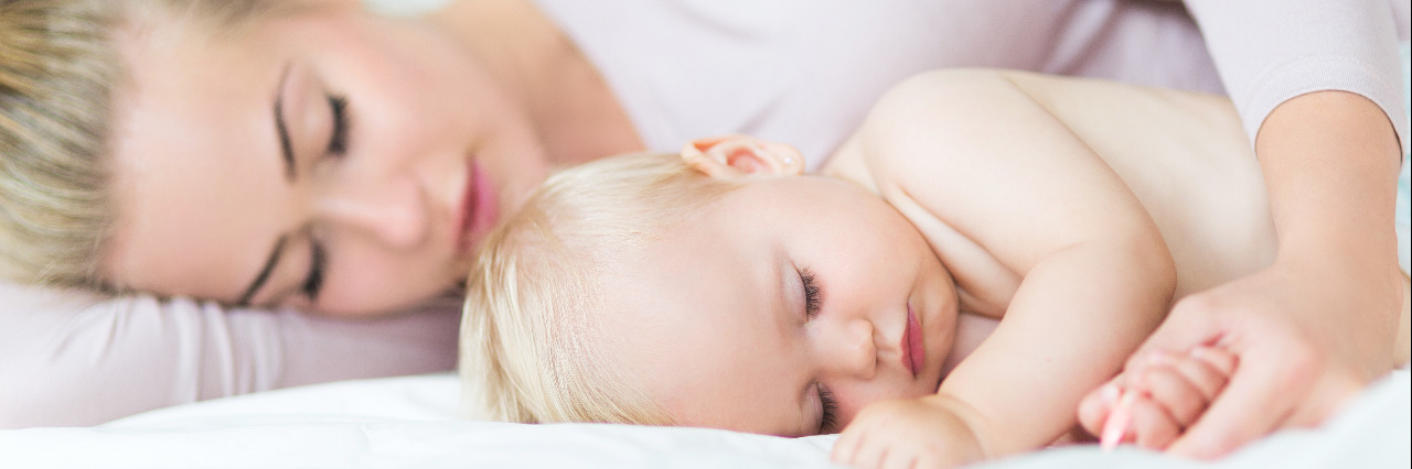 How Narcolepsy Has Made Me A Better Parent Mother napping with baby.