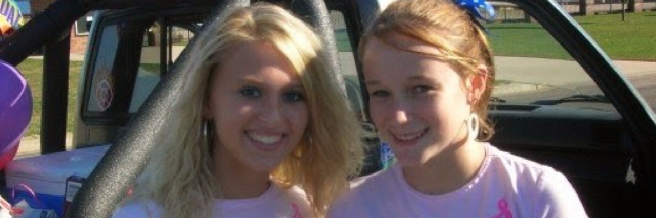 October Represents Pregnancy and Infant Loss Awareness month Amanda and her friend in "Save the Ta Tas shirts"