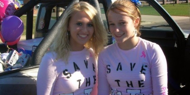 Amanda and her friend in "Save the Ta Tas shirts"