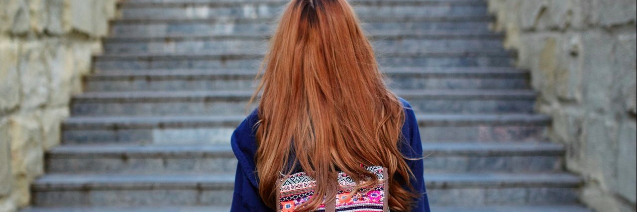 I Wish I Told a Teacher About My Invisible Illness student with a backpack about to climb steps